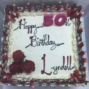 Happy 50th Birthday Lyndell, with decorative roses and strawberries