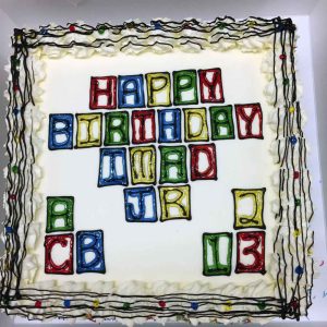 Happy Birthday Imad Jr, decorated with children's play blocks